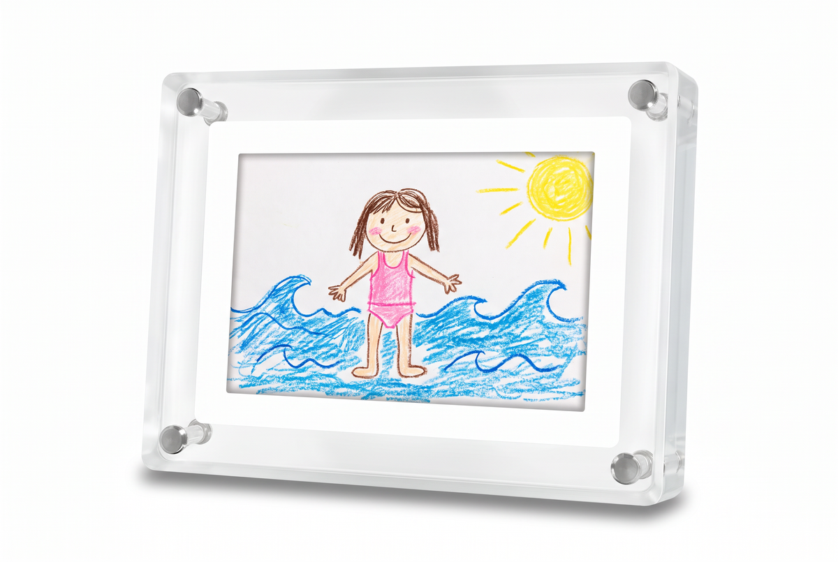 Little Picasso Frame showing a child's beach drawing